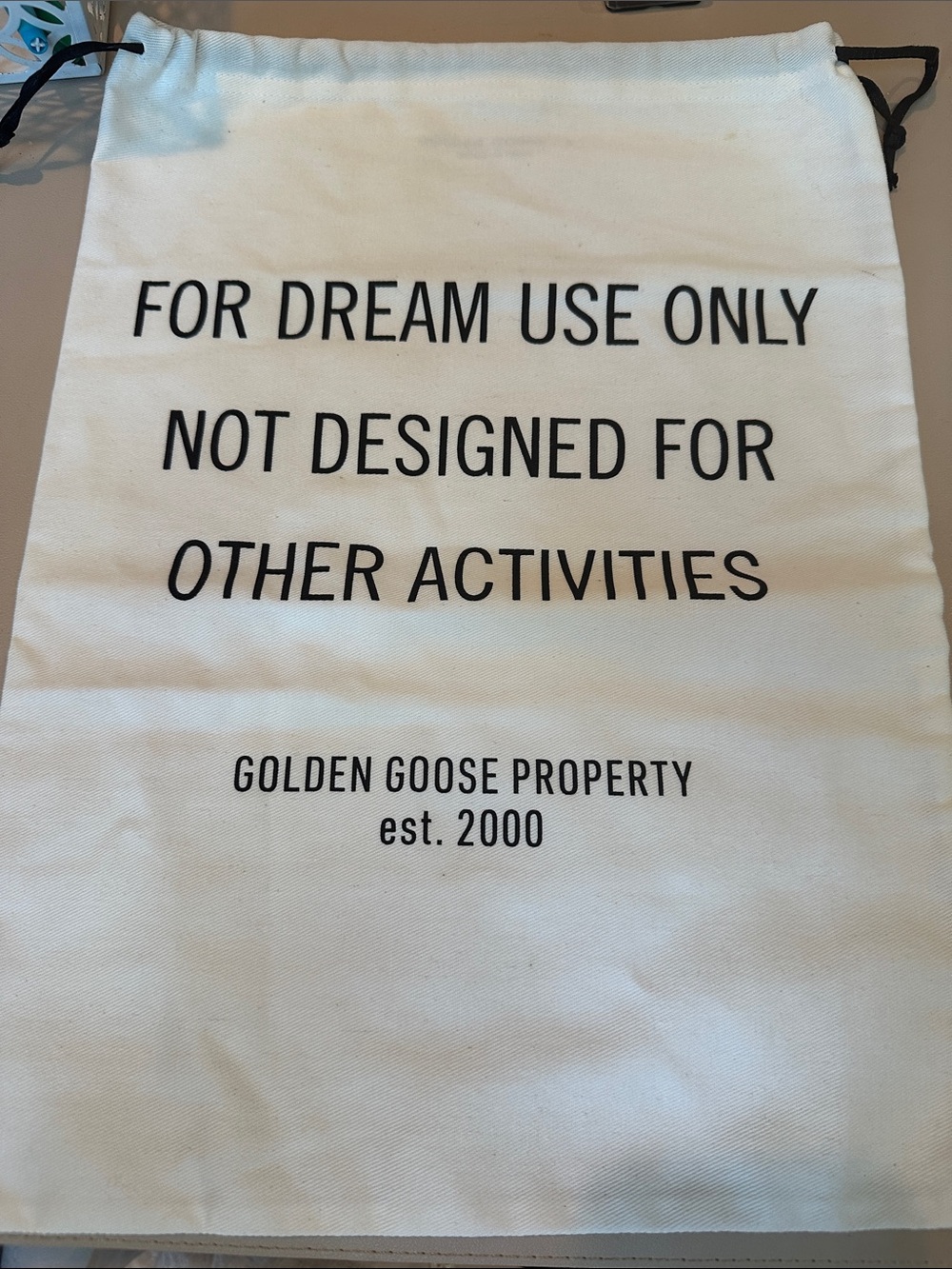 Golden Goose White Canvas Drawstring Bag with Black Text